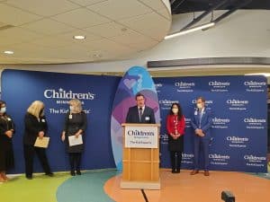 Dr. Ryan Williams is speaking at the grand opening of the Children's Minnesota mental health unit.