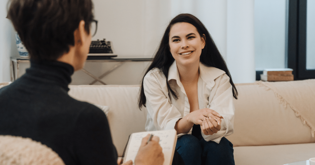 woman is talking to mental health provider about TMS treatment for depression
