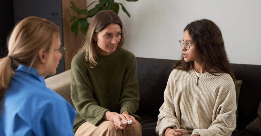 mom and daughter in family therapy to support her mental health