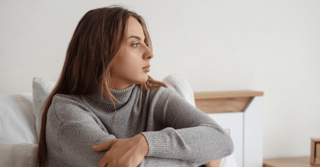 to deal with depression, a woman is taking a rest in bed to cope after a busy day