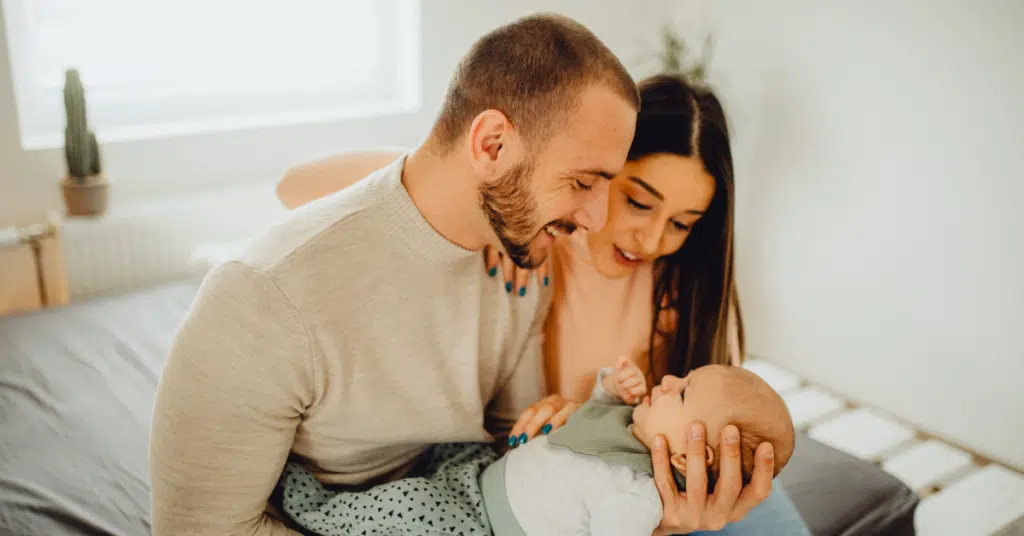 parents work together to care for their baby to help with some symptoms of mom brain
