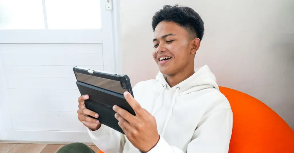 young man has a parasocial relationship with a gaming streamer