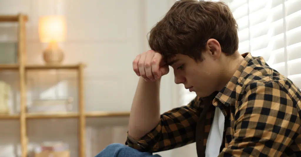 a teen is depressed after being mogged